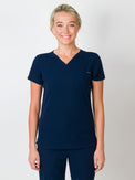 Navy-colored scrubs top with a single chest pocket and a V-neck, with Medgear branding.