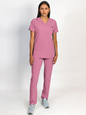 Scrub set in mauve color, V-neck top with three bottom front patch pockets and a matching pants with multiple pockets.