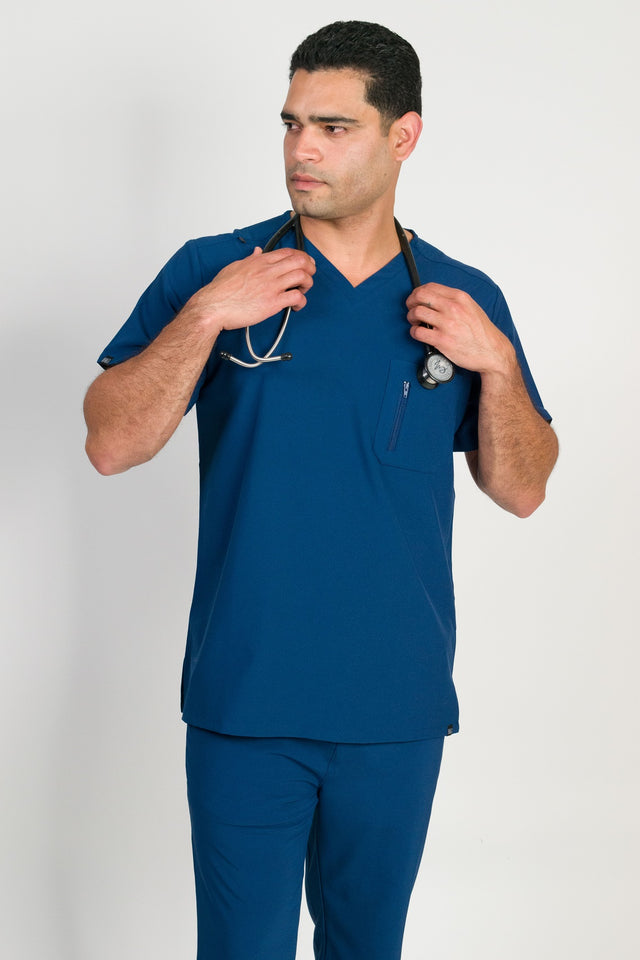 Blue short-sleeve V-neck scrubs top with two chest pockets.
